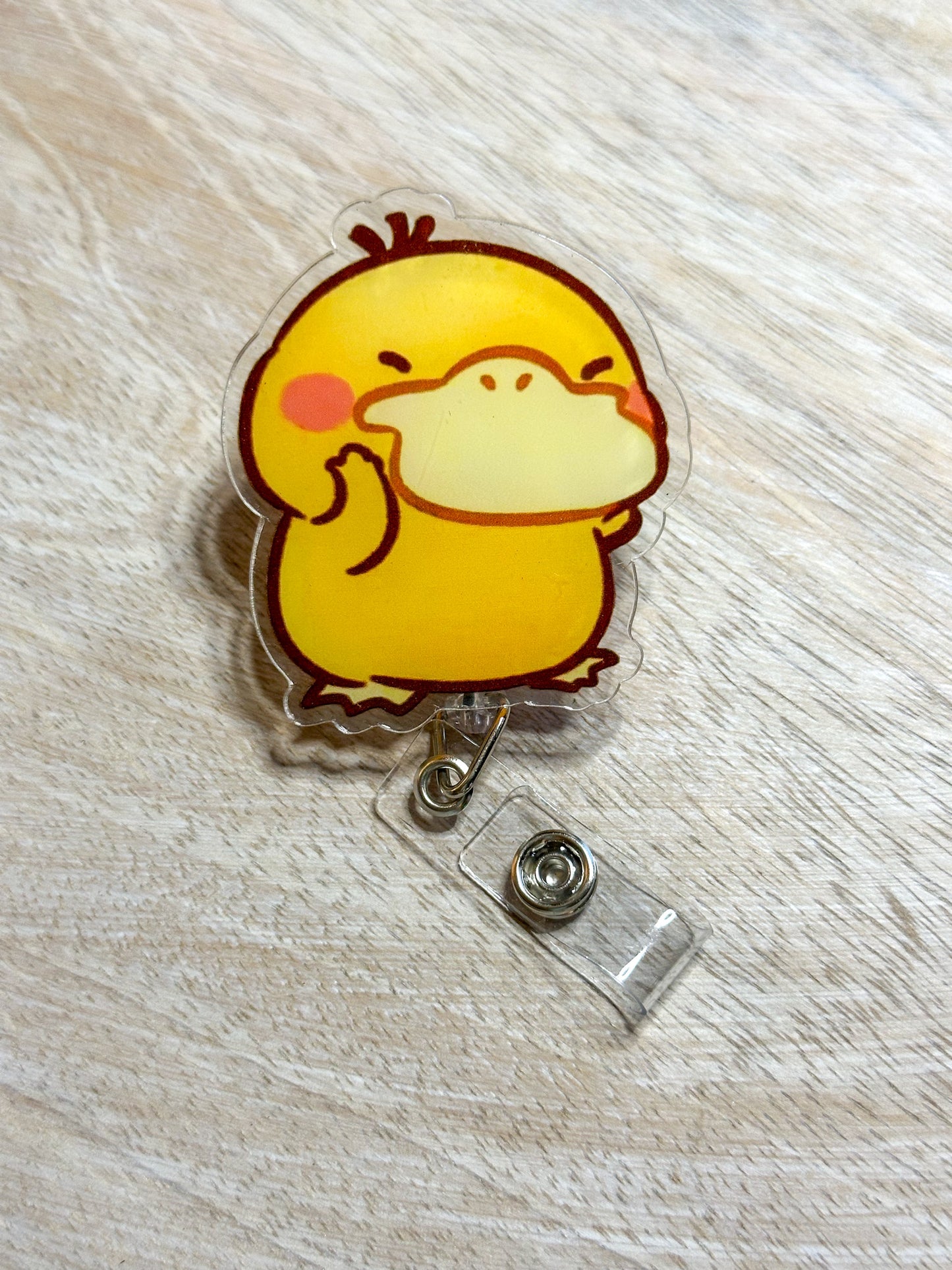 Psyduck Badge Reel