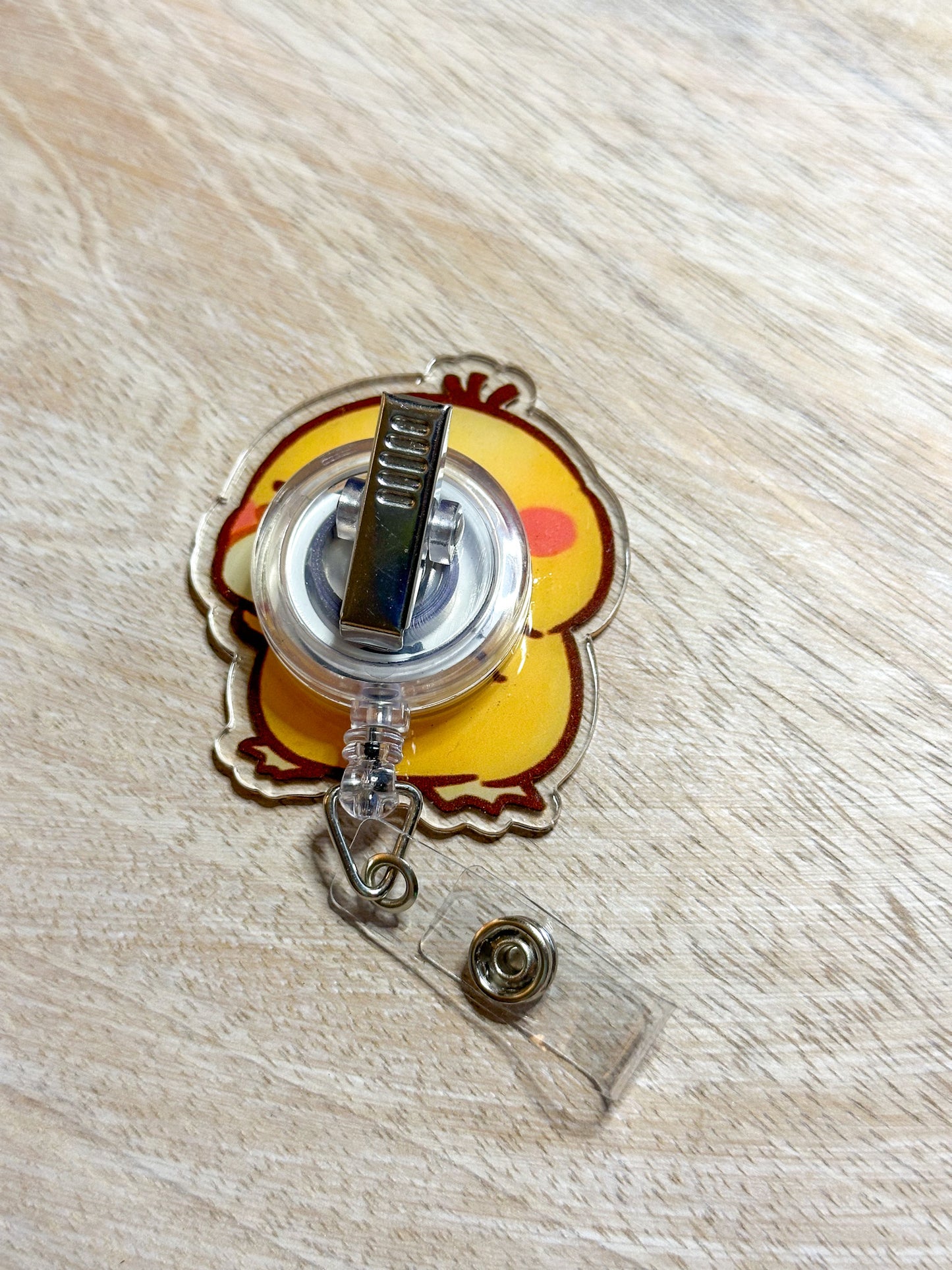 Psyduck Badge Reel