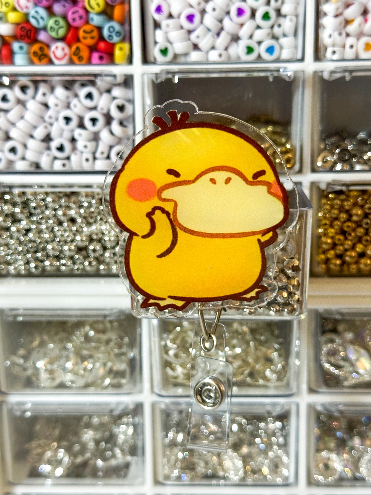 Psyduck Badge Reel